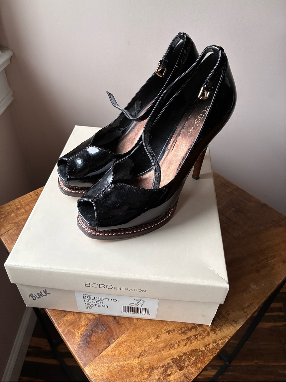 BCBGeneration Black Patent Peep-Toe Platform Pumps with Ankle Strap